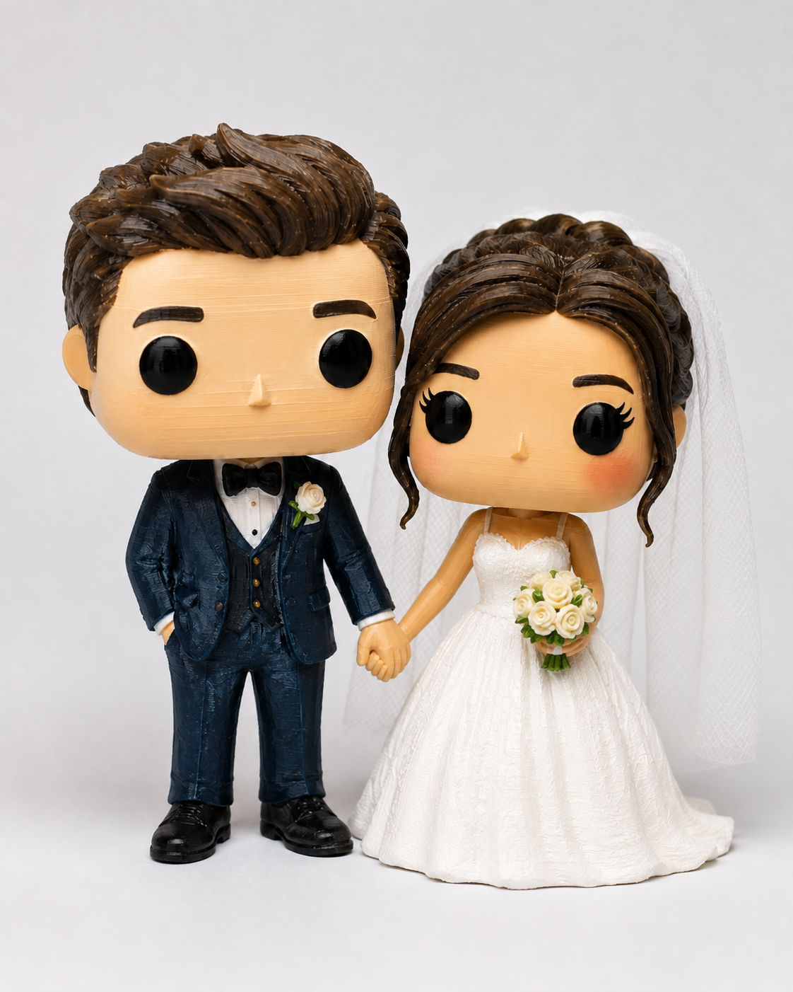 Pareja representada como figuras 3D personalizadas para una boda